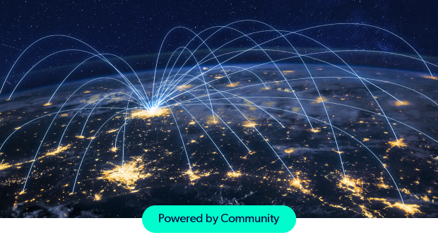 Bright city lights at night with illuminated network connections over a dark sky.