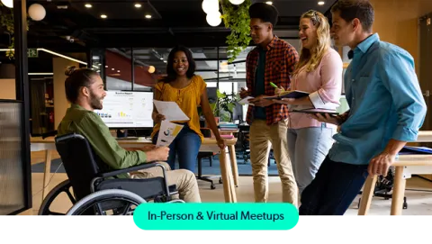 A group of professionals meeting in a modern office